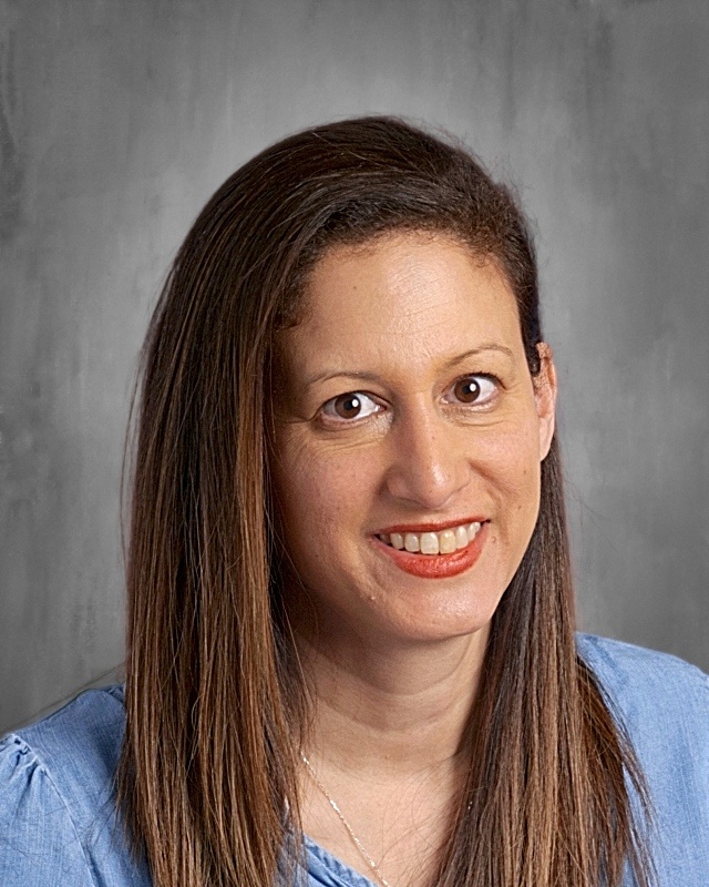 Ms. Angela Scarlato
